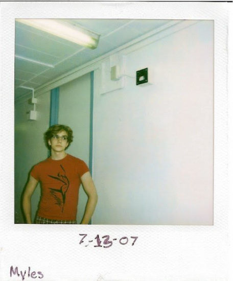 A polaroid photo of Myles Thatcher in his college dorm room in July 2007.