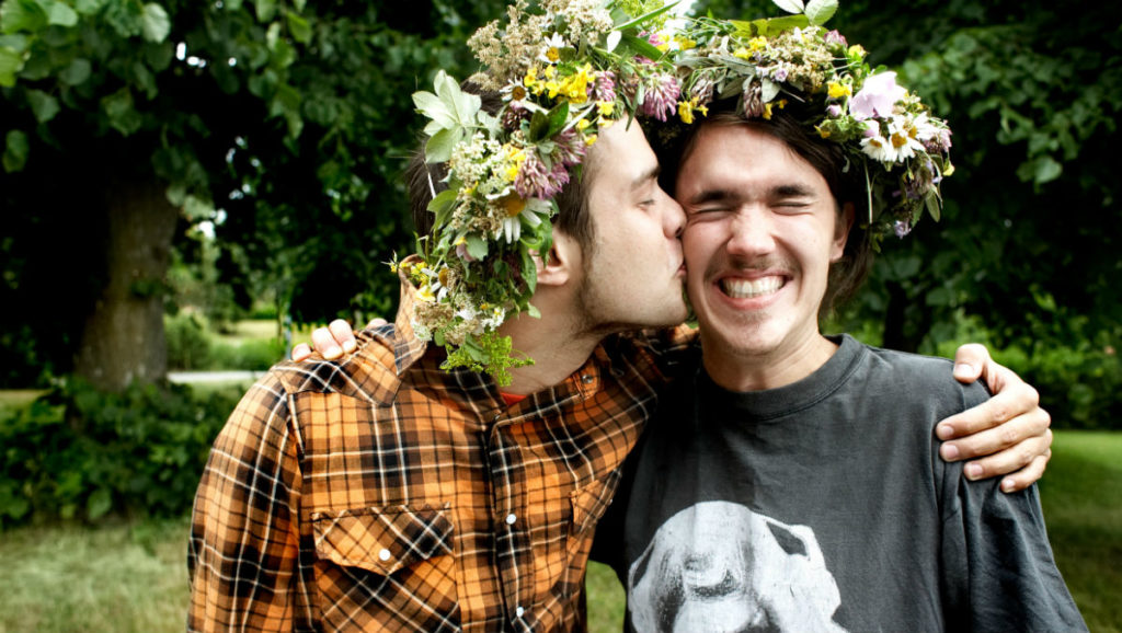 Men celebrating midsummer in Sweden