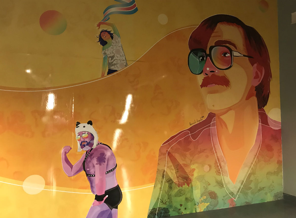 A mural featuring Carlos Jaúregui (right) in the Buenos Aires subway station