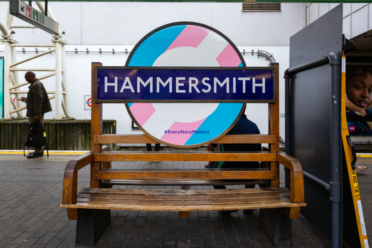A Pride-decorated sign at Hammersmith station in London