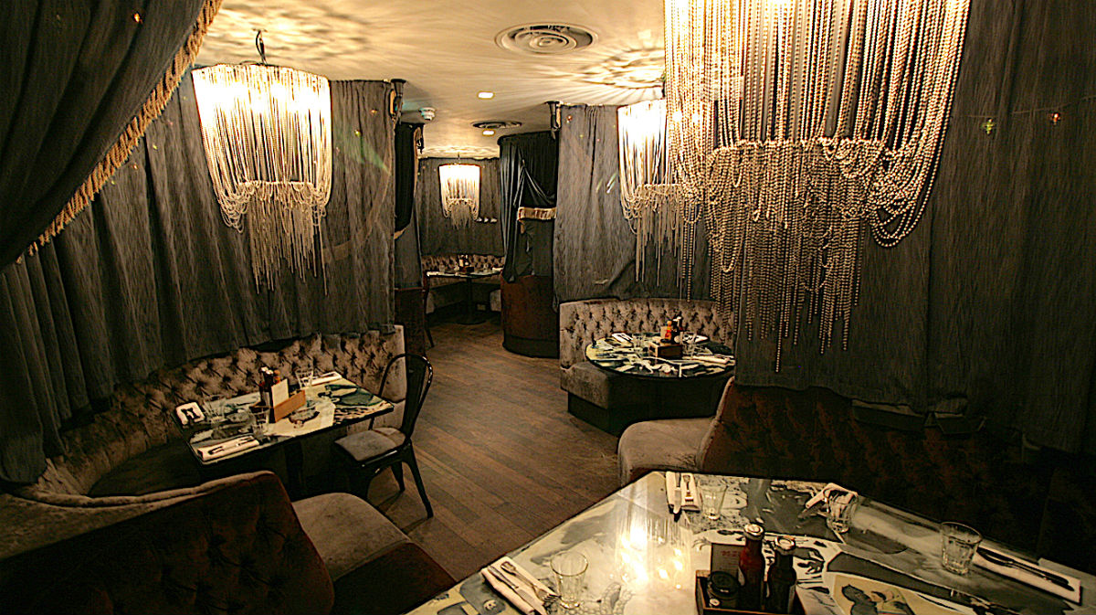 The plush booths at the back of Balans No 60, Old Compton Street, London