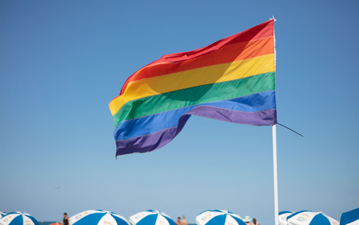 A rainbow flag over 12th Street Beach, Miami