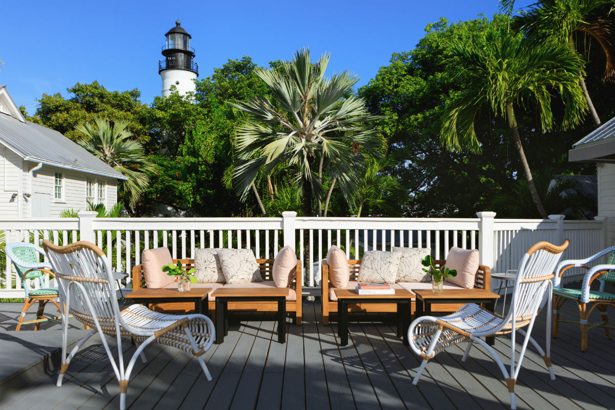 A terrace at the Kimpton Key West Lighthouse hotel
